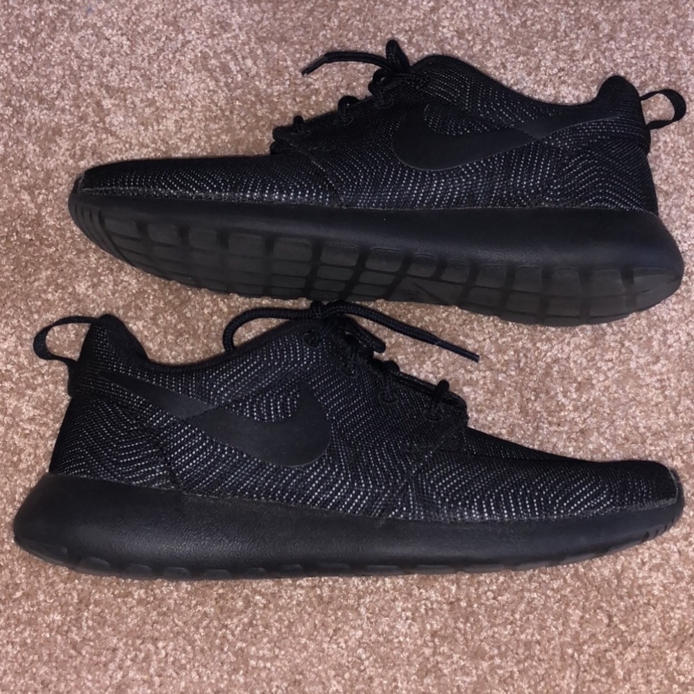 Black Nike athletic shoes